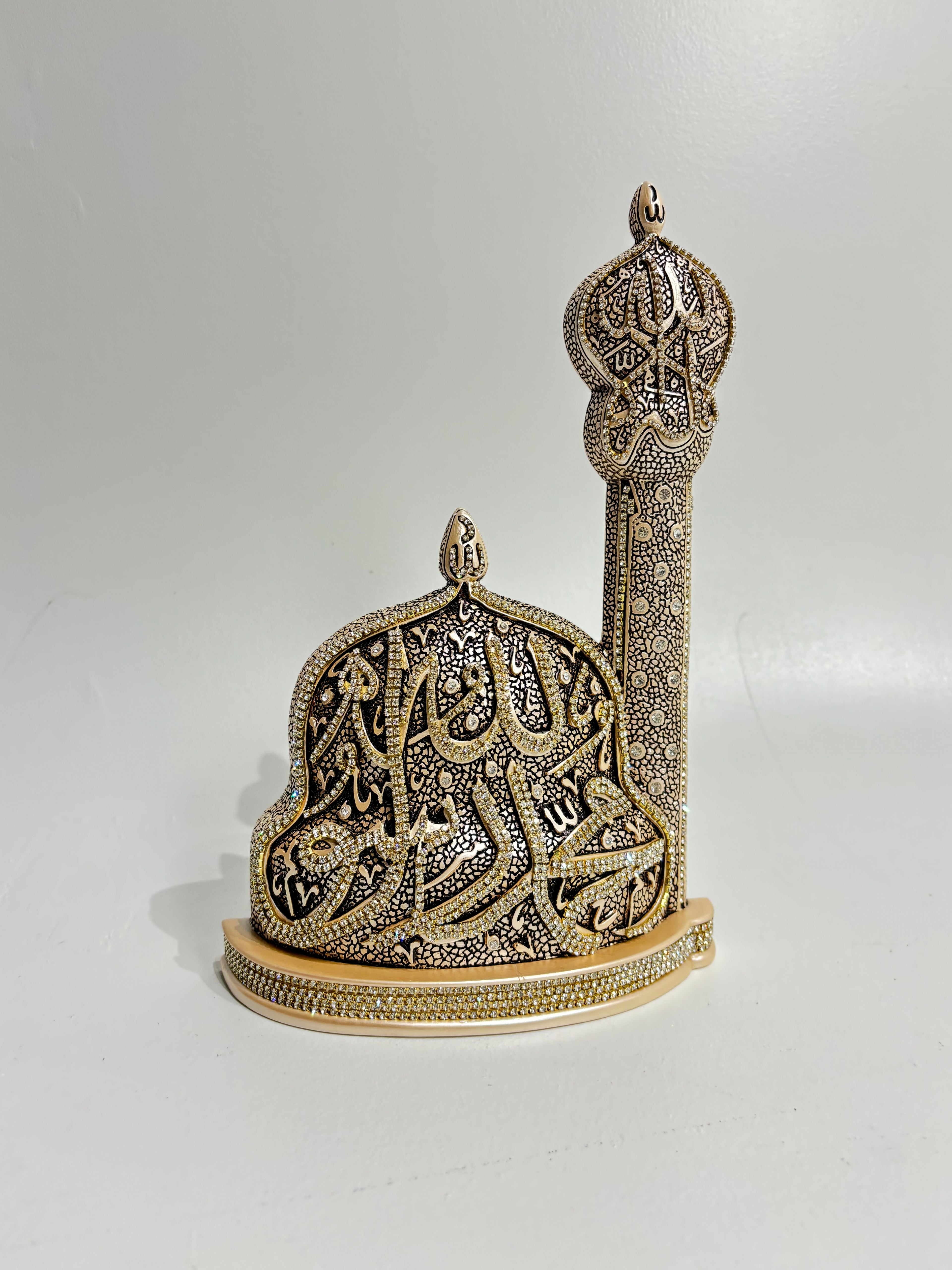 Islamic table decoration featuring Arabic calligraphy.